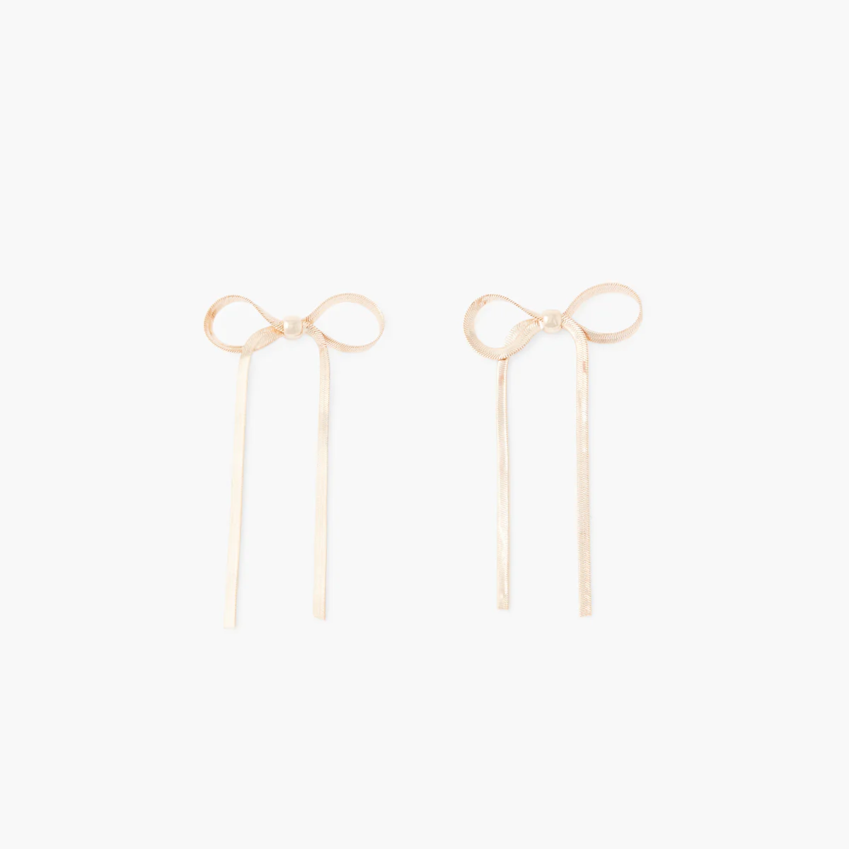 Grandes boucles d'oreilles pendantes nœuds dorés