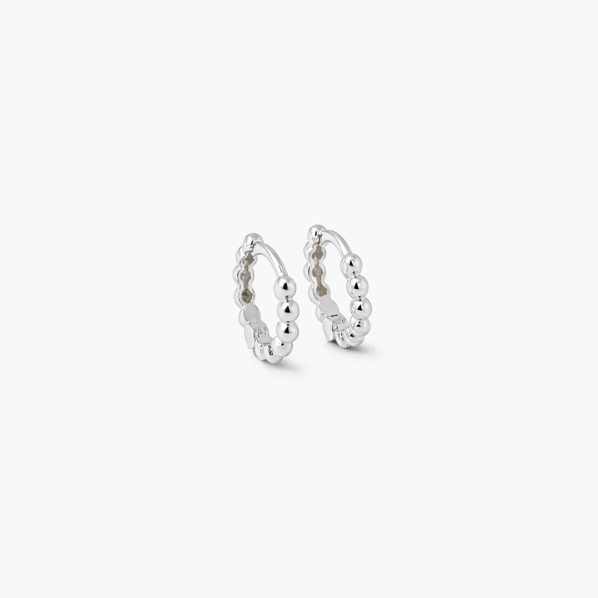 Petites créoles en argent garanti